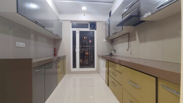 Kitchen in 2 BHK Apartment at Dosti Group Imperia, Manpada – for Rent