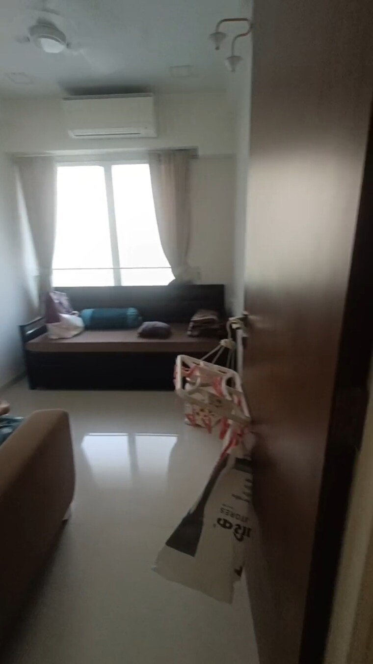Living Room, courtyard-by-narang-realty-and-the-wadhwa-group 2 Bedroom 542 Sq.Ft. Apartment In Pokhran Road No Two Thane 10017751