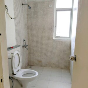 Bathroom in 3 BHK Apartment at Jaypee Greens Kosmos, Sector 134 – for Sale