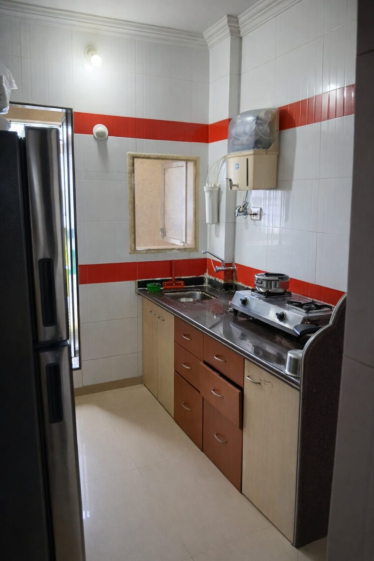 Kitchen, karma-krishn-kunj-complex 2 Bedroom 860 Sq.Ft. Apartment In Nalasopara West Palghar 10036349