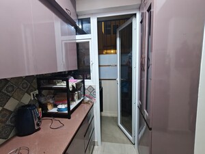 Kitchen in 3 BHK Apartment at Smart World Orchard, Sector 61 – for Rent