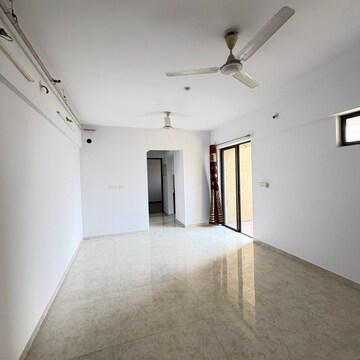 Living Room in 1 BHK Apartment at Lodha Palava City Lakeshore Greens, Hedutane – for Sale