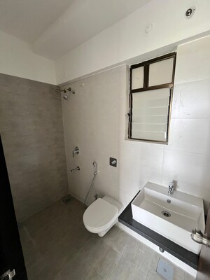Bathroom in 2 BHK Apartment at Roshan Milestone, Tathawade – for Rent