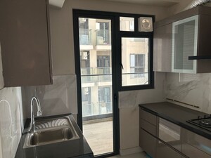 Kitchen in 3 BHK Apartment at Smart World Orchard, Sector 61 – for Rent