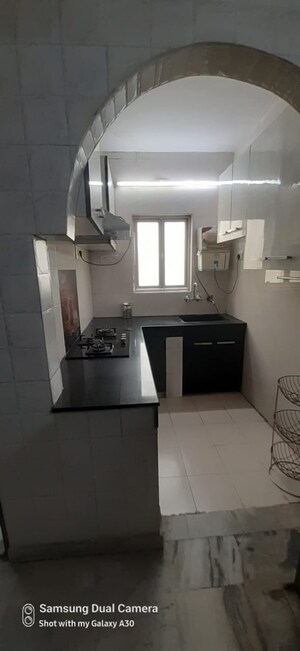 Kitchen in 2 BHK Apartment at Jungpura Extension – for Sale