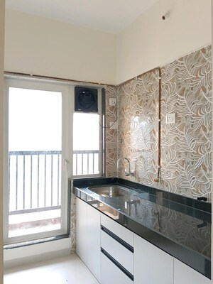 Kitchen in 2 BHK Apartment at Dosti Vihar, Samata Nagar – for Rent