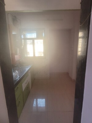 Kitchen in 1 BHK Apartment at Ghodbunder Road – for Sale