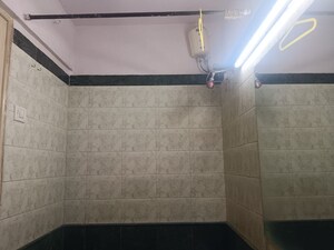 Bathroom in 2 BHK Apartment at Ashoka Madhuban CHS, Malad East – for Rent
