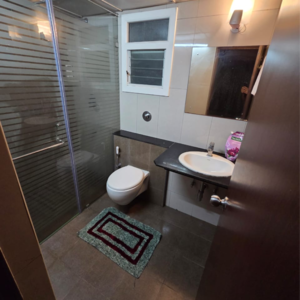 Team Area in 2 BHK Apartment at Puravankara Palm Beach, Essel Gardens – for Rent