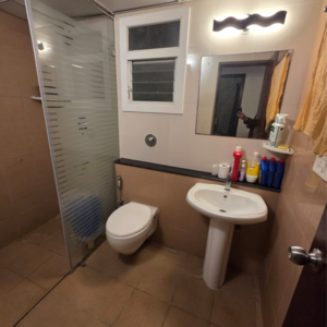 Team Area in 2 BHK Apartment at Puravankara Palm Beach, Essel Gardens – for Rent