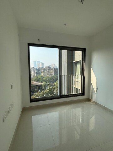 Room in 2 BHK Apartment at Sunteck City Avenue 4, Goregaon West – for Sale