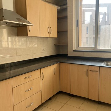 Kitchen in 2 BHK Apartment at Unitech Escape, Rosewood City – for Rent