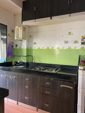 Kitchen in 1 BHK Apartment at Dheeraj Godavari Apartment, Malad West – for Sale