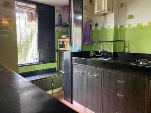 Kitchen in 1 BHK Apartment at Dheeraj Godavari Apartment, Malad West – for Sale