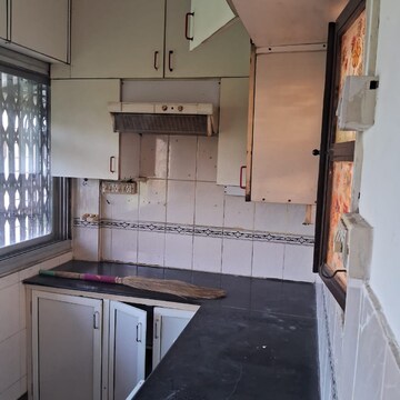 Kitchen in 2 BHK Apartment at Triveni CHS Andheri, Tepgaon – for Rent