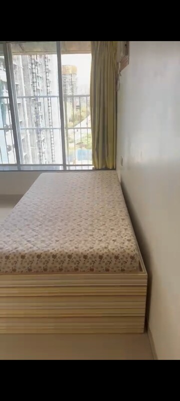 Room in 2 BHK Apartment at Rustomjee OZone, Goregaon West – for Rent