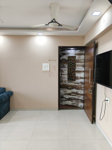 Living Room in 2 BHK Apartment at Juhi Lawns, Seawoods – for Rent