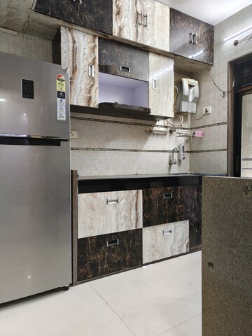 Kitchen in 2 BHK Apartment at Juhi Lawns, Seawoods – for Rent