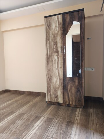 Bedroom in 2 BHK Apartment at Juhi Lawns, Seawoods – for Rent