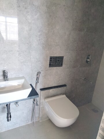 Bathroom in 1 BHK Apartment at Omkar Signet, Malad East – for Rent