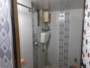 Bathroom in 2 BHK Apartment at Jyoti Complex, Goregaon East – for Rent