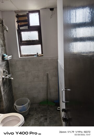 Bathroom in 1 BHK Apartment at Auric City Homes, Sector 82 – for Rent