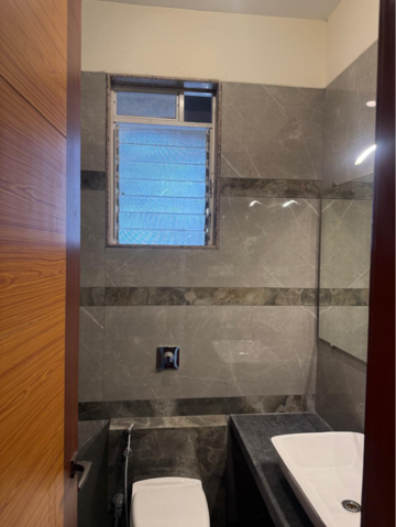 Bathroom in 3 BHK Apartment at Paradise Sai World Empire, Rohinjan – for Rent