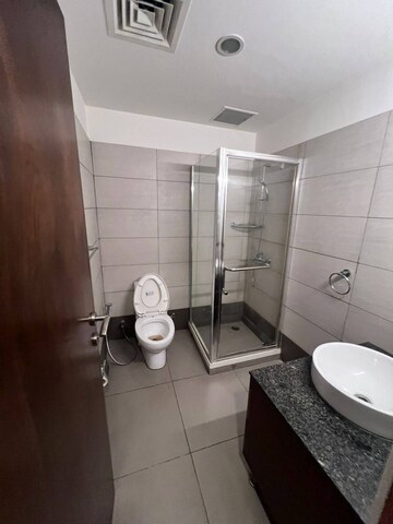 Bathroom in 3 BHK Apartment at Maya Green Lotus Saksham, International Airport Road – for Rent