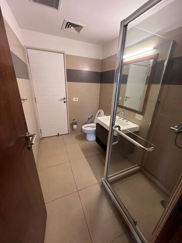 Bathroom in 3 BHK Apartment at Maya Green Lotus Saksham, International Airport Road – for Rent