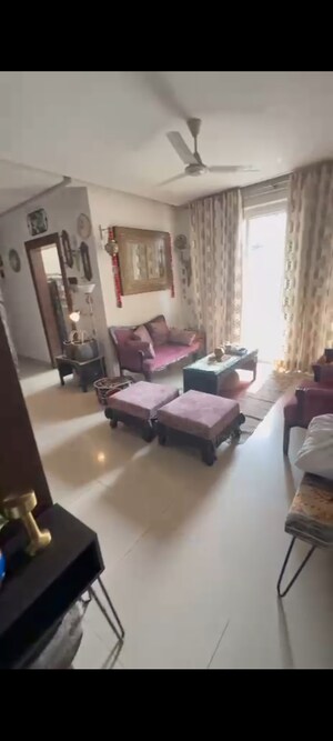 Living Room in 3 BHK Apartment at Emaar Palm Gardens, Sector 83 – for Sale