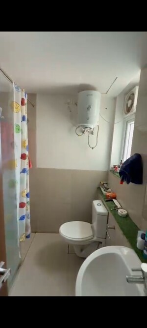 Bathroom in 3 BHK Apartment at Emaar Palm Gardens, Sector 83 – for Sale