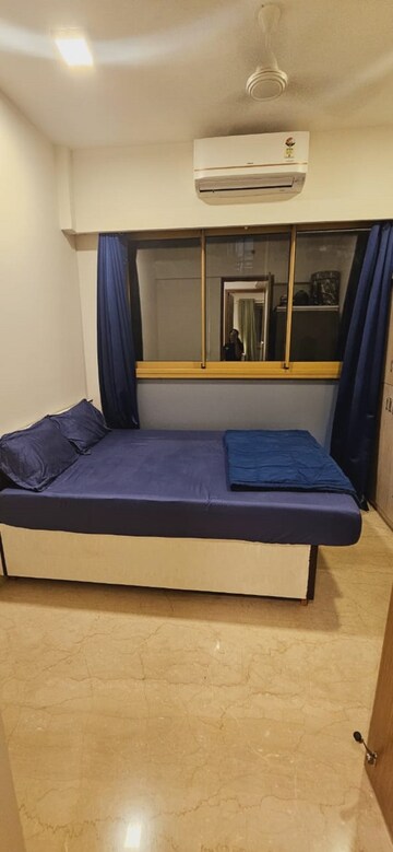 Bedroom in 2 BHK Apartment at Godrej RKS, Chembur – for Rent