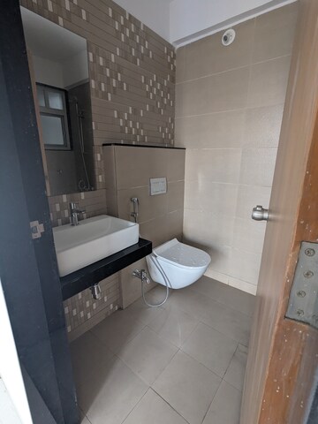 Bathroom in 2 BHK Apartment at Ankur CHS Chikhali, Chikhali – for Sale