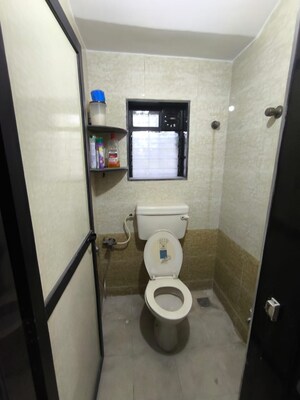 Bathroom in 2 BHK Apartment at Vrindavan Society – for Rent