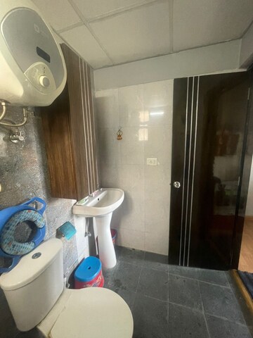 Bathroom in Studio Apartment at Galaxy Blue Sapphire Plaza, Sector 4 Greater Noida – for Sale