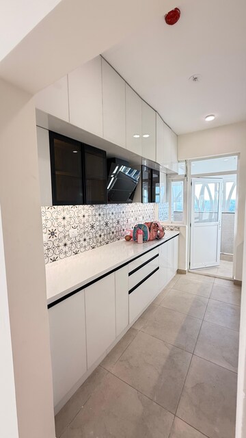 Kitchen in 2 BHK Apartment at Sobha Dream Gardens, Thanisandra Main Road – for Rent