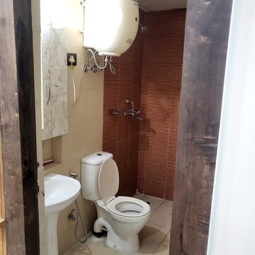 Bathroom in 3 BHK Apartment at Mahagun Mywoods, Sector 16c Greater Noida – for Rent