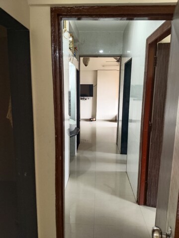 Building Lobby in 2 BHK Apartment at Shree Satya Shankar Residency, Manpada – for Rent
