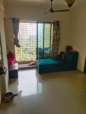 Living Room in 2 BHK Apartment at Shree Satya Shankar Residency, Manpada – for Rent