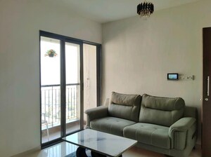 Living Room in 2 BHK Apartment at Runwal Eirene, Balkum Pada – for Rent
