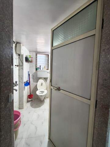 Bathroom in 2 BHK Apartment at Shanti Dham Heights, Parsik – for Sale