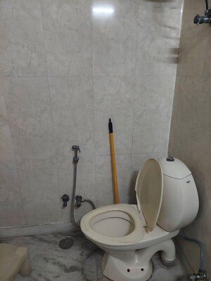 Bathroom in 3 BHK Apartment at Dwarka – for Rent