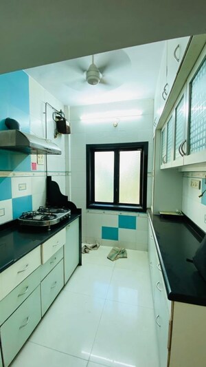 Kitchen in 2.5 BHK Apartment at Nirman CHS Malad West, Malad West – for Rent