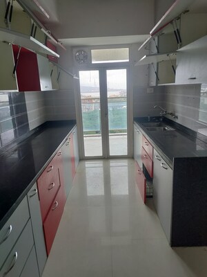 Kitchen in 2 BHK Apartment at Omkar Veda Exclusive, Parel – for Rent