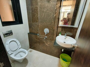 Bathroom in 1 BHK Apartment at MICL Aaradhya Parkwood, Mira Road – for Rent