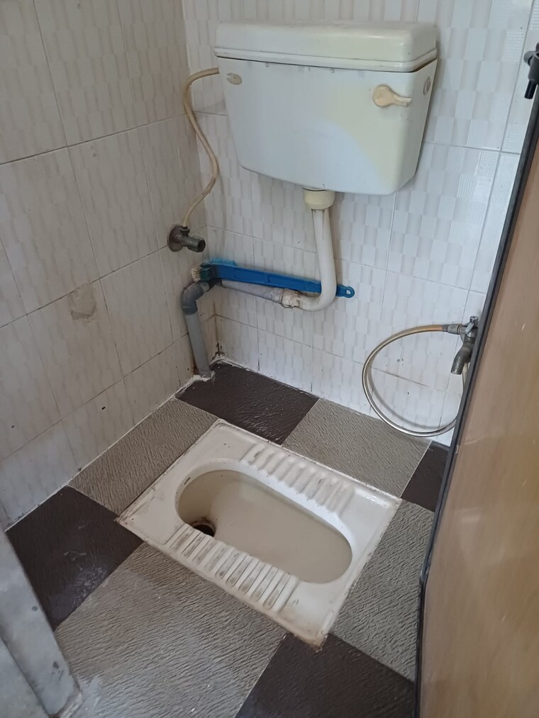 Bathroom, surya-kiran-chs-ghansoli 1 Bedroom 678 Sq.Ft. Apartment In Ghansoli Navi Mumbai 10652190