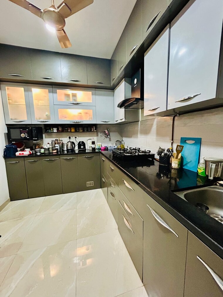 Kitchen, gera-world-of-joy 2 Bedroom 900 Sq.Ft. Apartment In Kharadi Pune 10056539