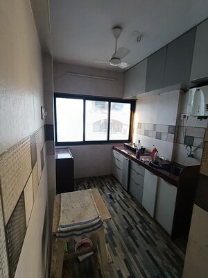 Kitchen in 3 BHK Apartment at Skylark CHS, Andheri West – for Rent