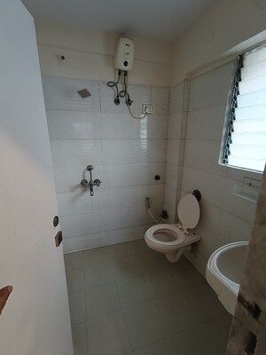 Bathroom in 3 BHK Apartment at Skylark CHS, Andheri West – for Rent