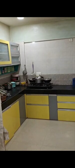Kitchen in 2 BHK Apartment at Sudhir Mandke Armaan , Viman Nagar – for Rent